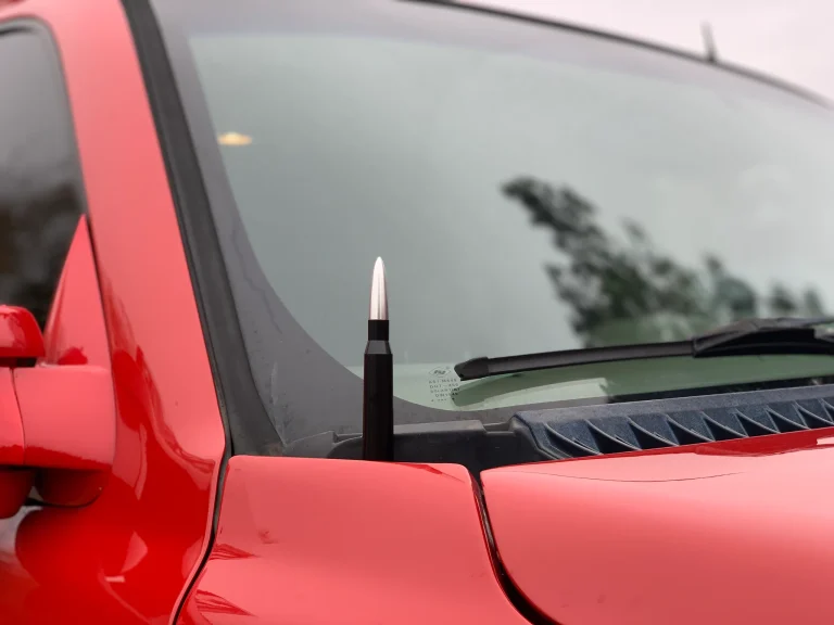 50 cal bullet antenna on red truck