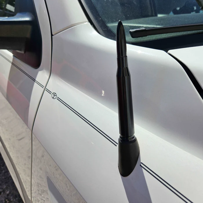 bullet antenna on white truck